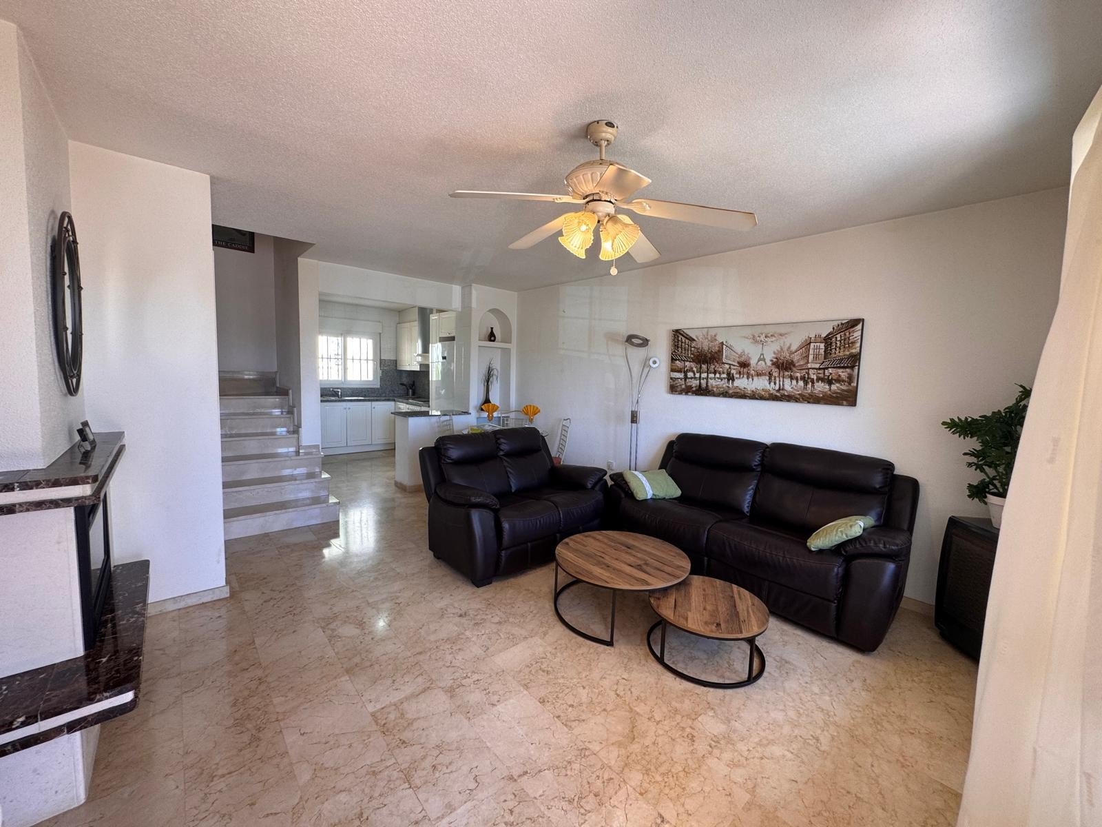   This beautifully presented 2-bedroom, 2.5-bathroom, three-storey townhouse is ideally located on the prestigious and award-winning Las Ramblas Golf 