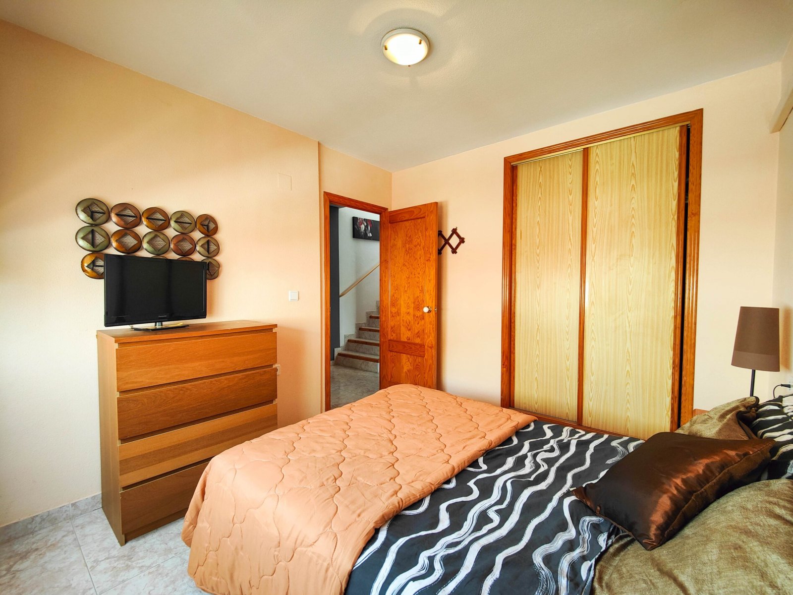   Beautiful corner quad house with a huge garden for sale in El Mirador de Los Altos, Orihuela Costa.  This charming quad house is located in a well-e