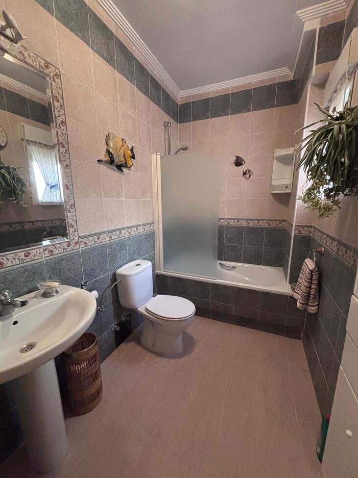   Charming Two-Bedroom Townhouse in Villamartin
This lovely two-bedroom townhouse is situated within a secure gated community in the sought-