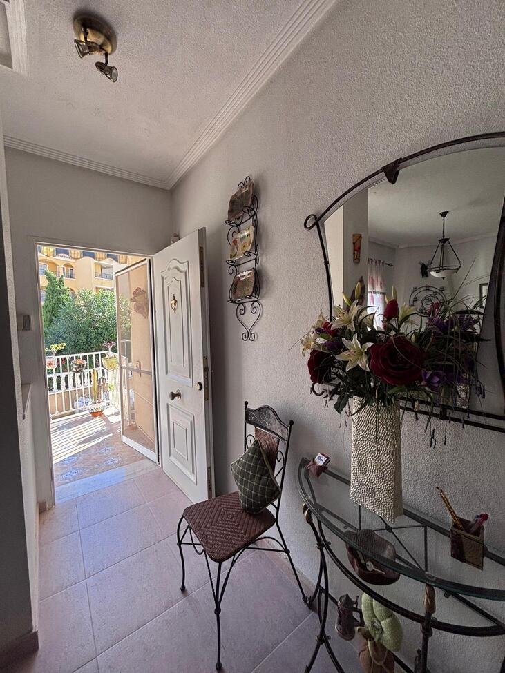   Charming Two-Bedroom Townhouse in Villamartin
This lovely two-bedroom townhouse is situated within a secure gated community in the sought-