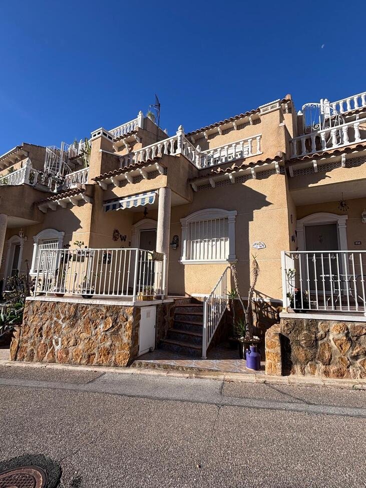   Charming Two-Bedroom Townhouse in Villamartin
This lovely two-bedroom townhouse is situated within a secure gated community in the sought-