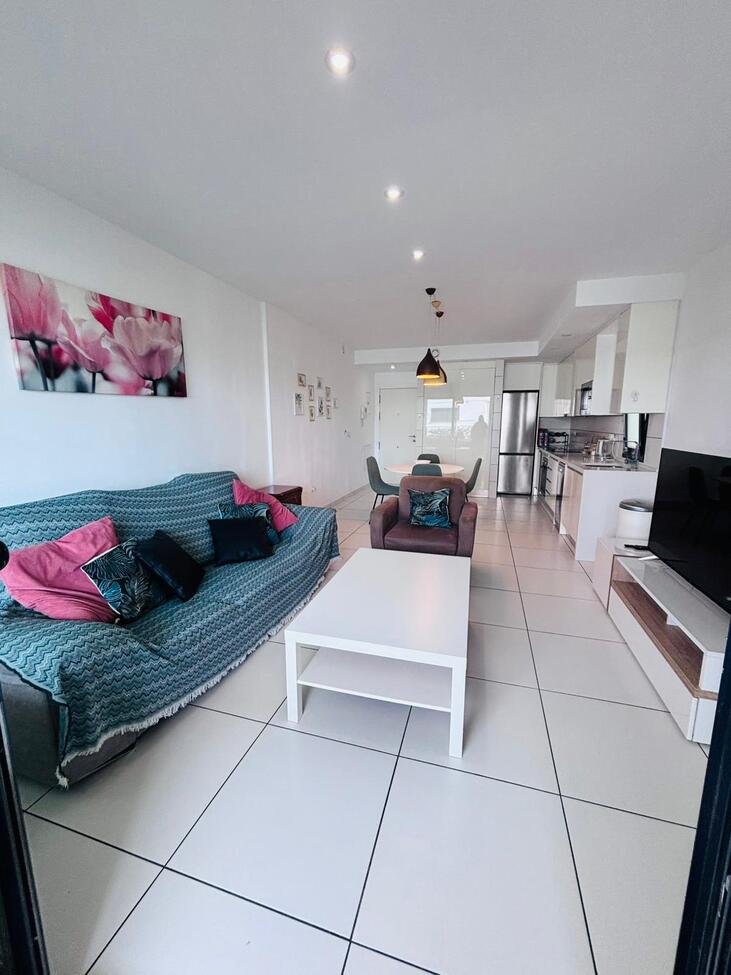   Beautifully presented second-floor apartment offering 2 bedrooms and 2 bathrooms, located in a sought-after gated community near Villamartin Plaza.&