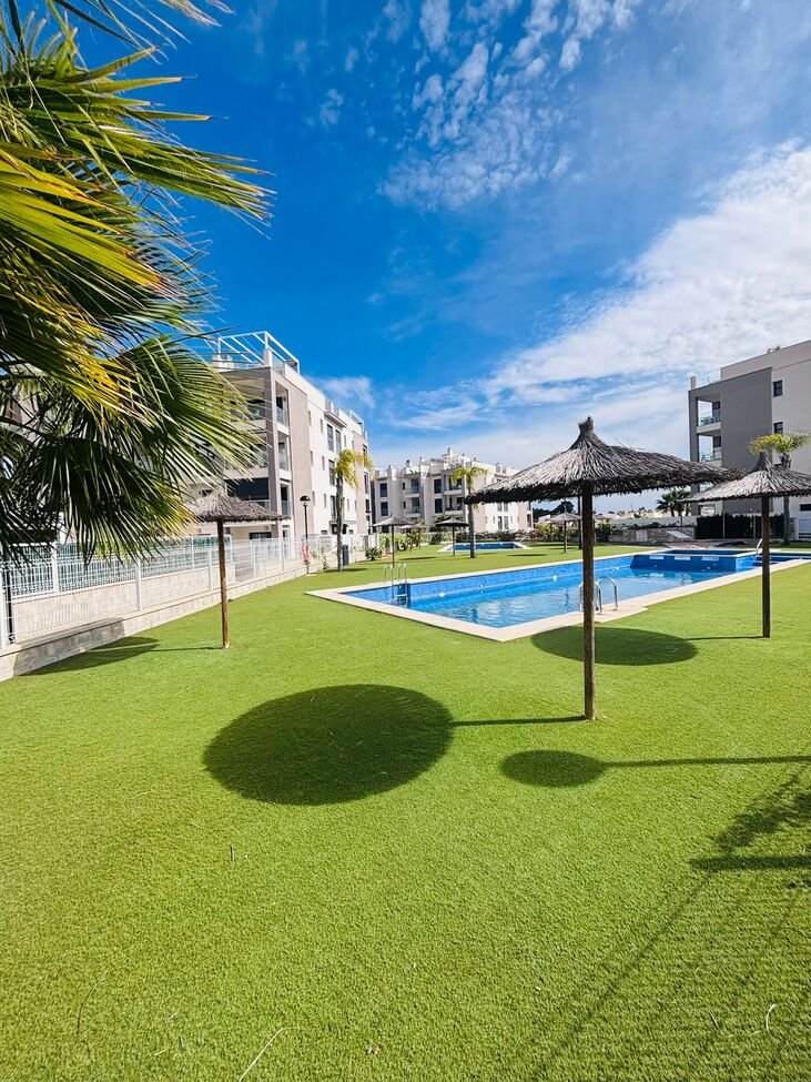   Beautifully presented second-floor apartment offering 2 bedrooms and 2 bathrooms, located in a sought-after gated community near Villamartin Plaza.&