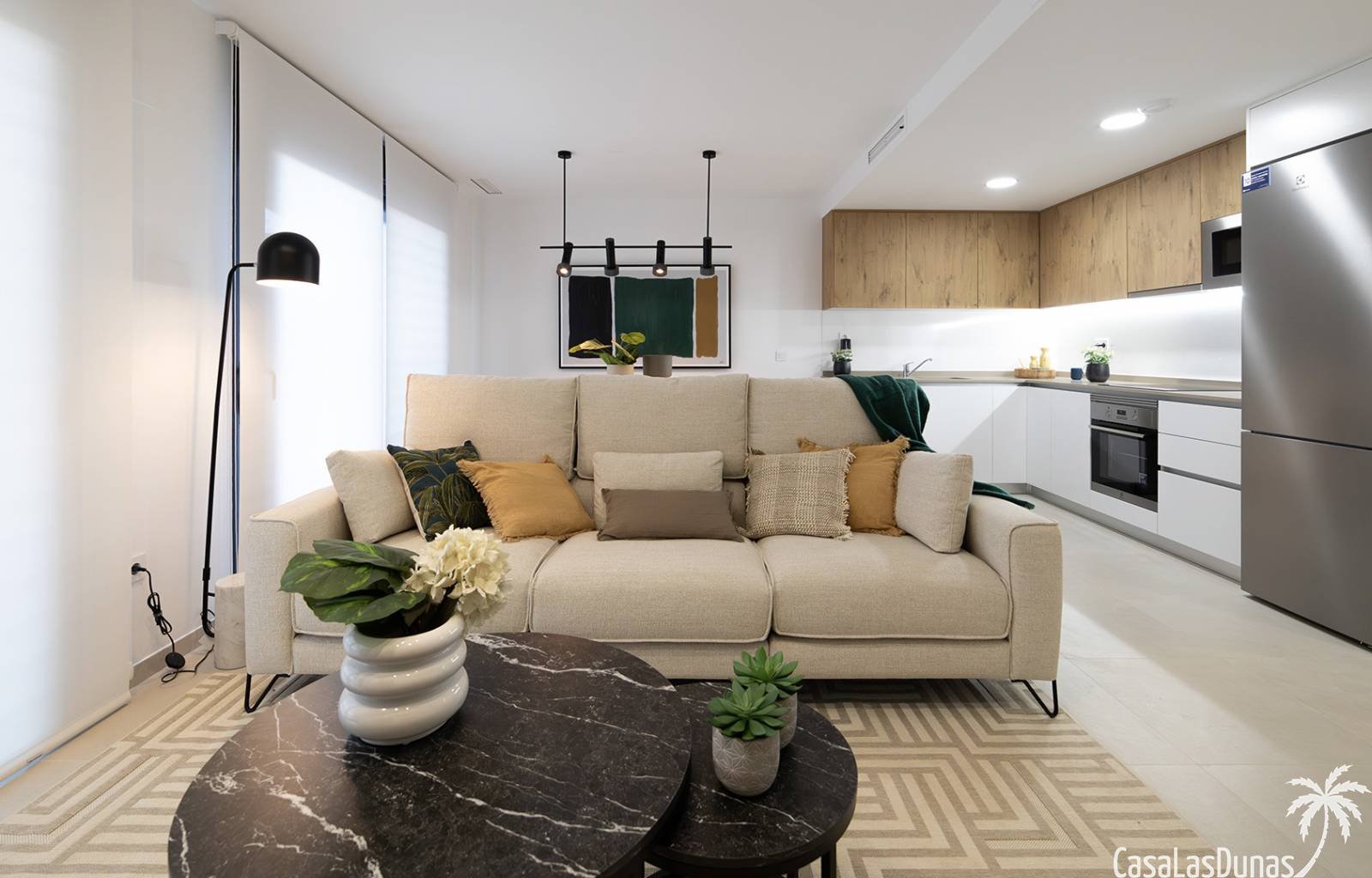  Nur wenige Gehminuten vom Strand entfernt, inmitten der Natur und dennoch in unmittelbarer Nähe zu allen Annehmlichkeiten: Dieses exklusive Neubaupro