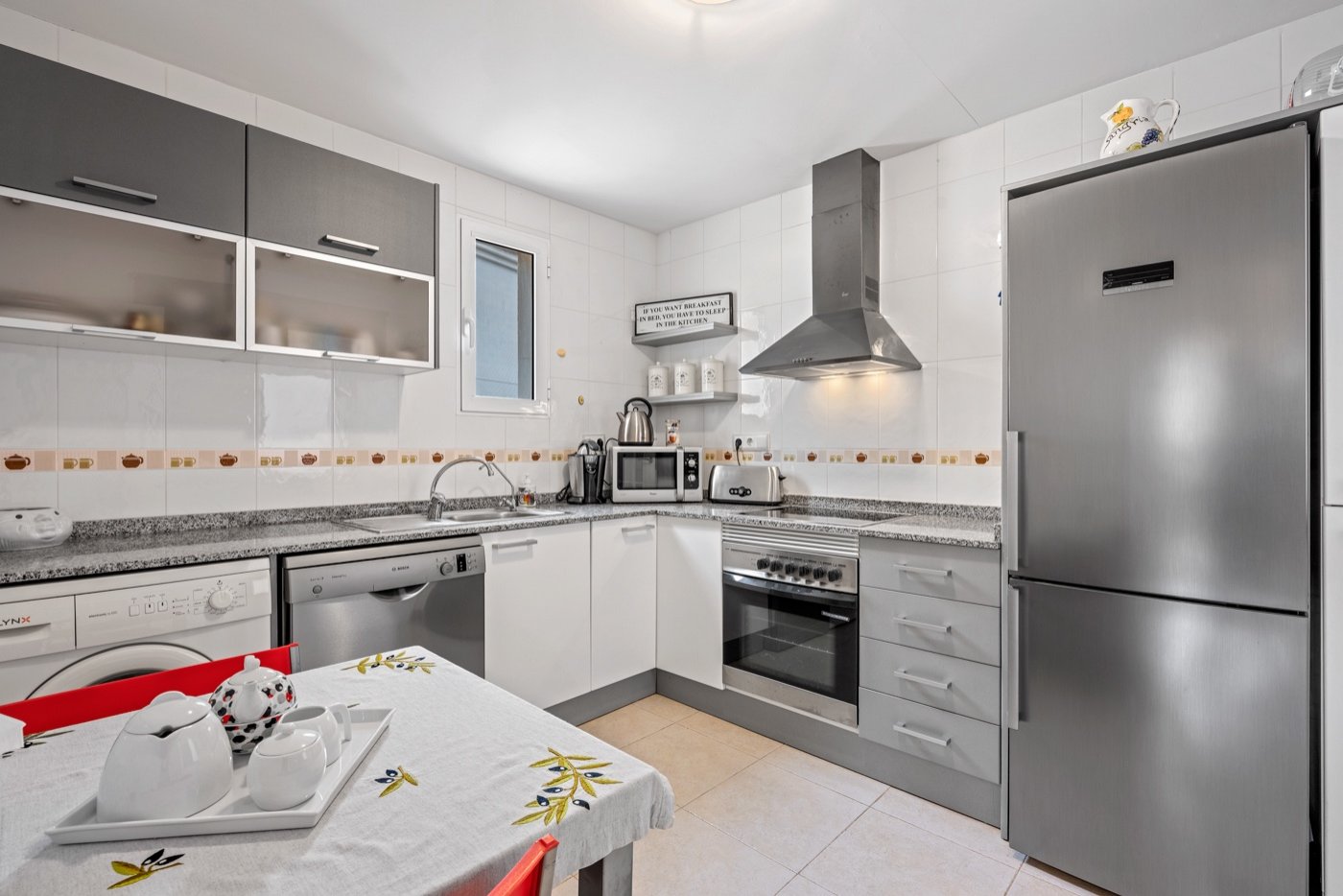   This beautifully maintained duplex apartment offers comfort, space, and pleasant natural light thanks to its south-facing location . The property fe