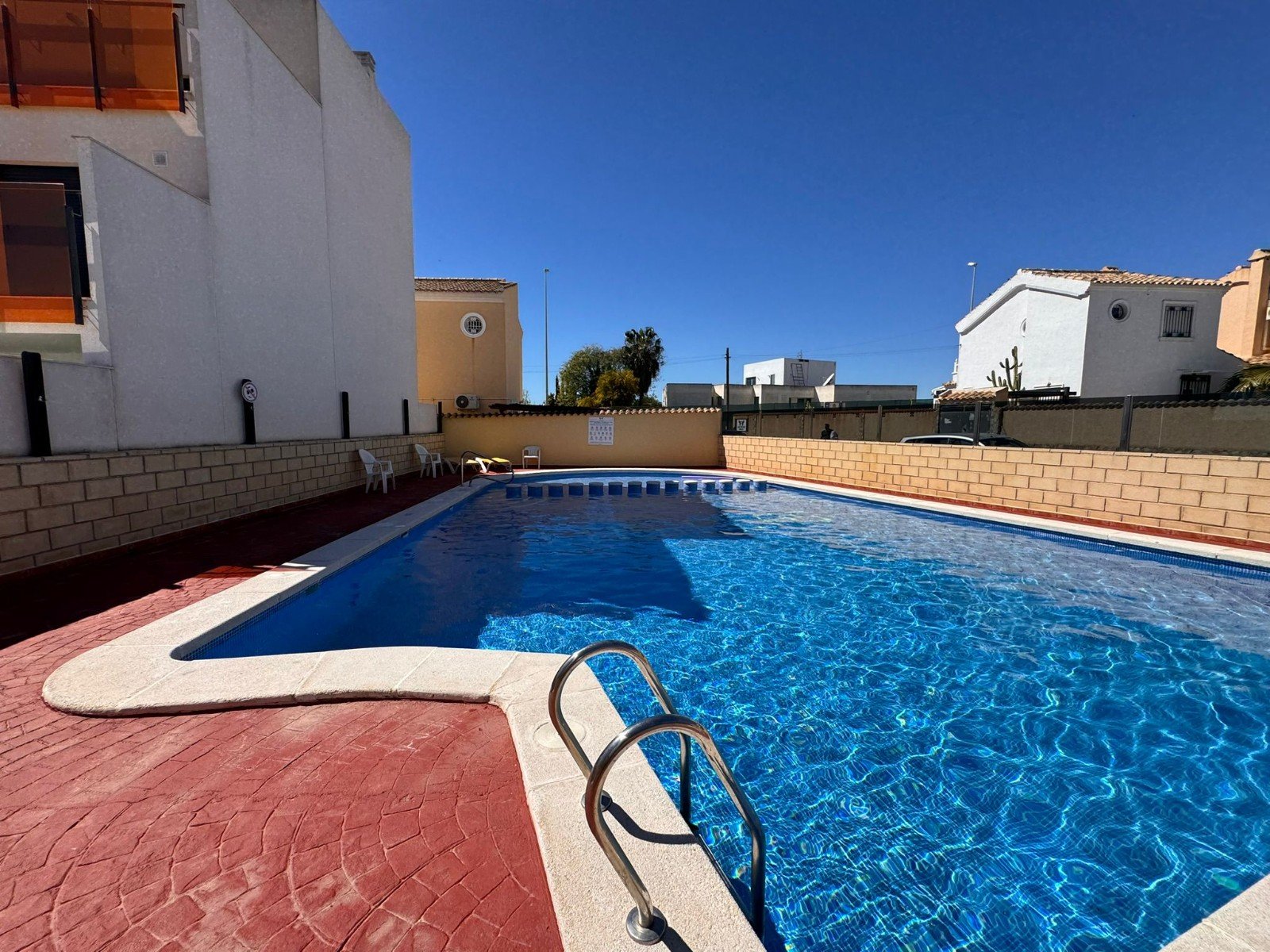   This charming property is tucked away in a lovely cul-de-sac, offering peace and privacy. Distributed over three levels, the home features three spa