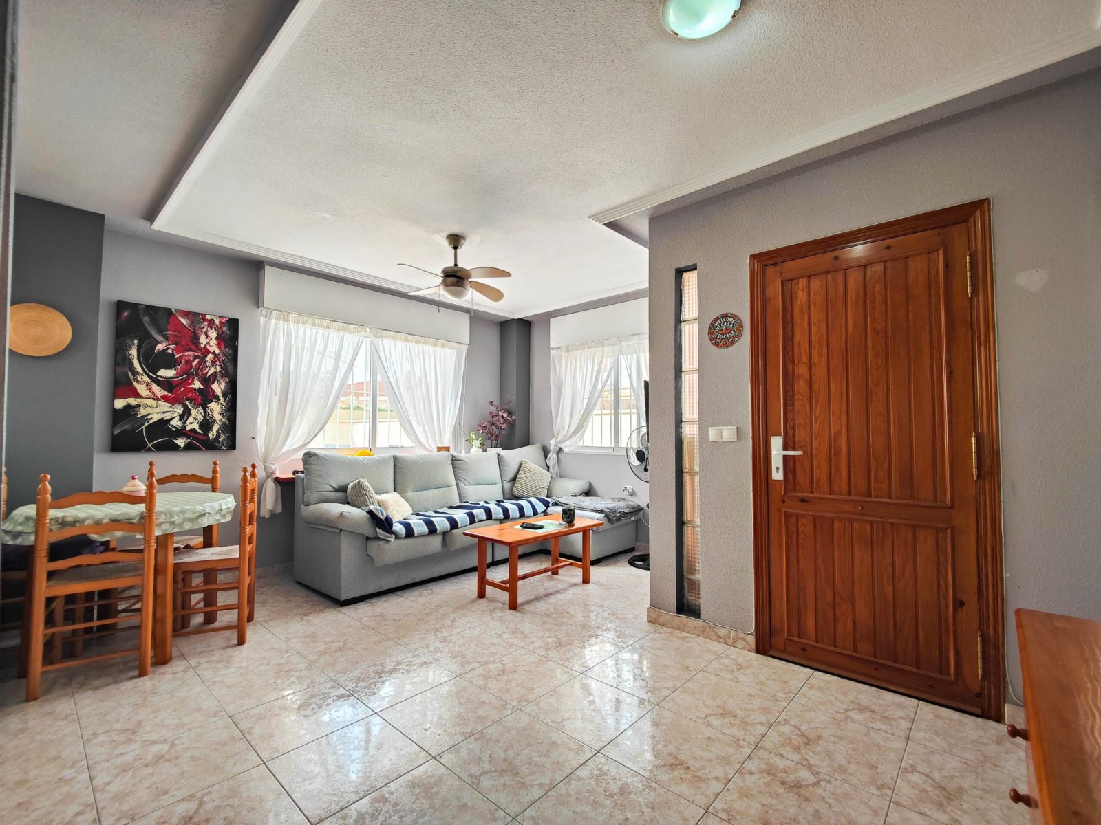   Beautiful corner quad house with a huge garden for sale in El Mirador de Los Altos, Orihuela Costa.  This charming quad house is located in a well-e
