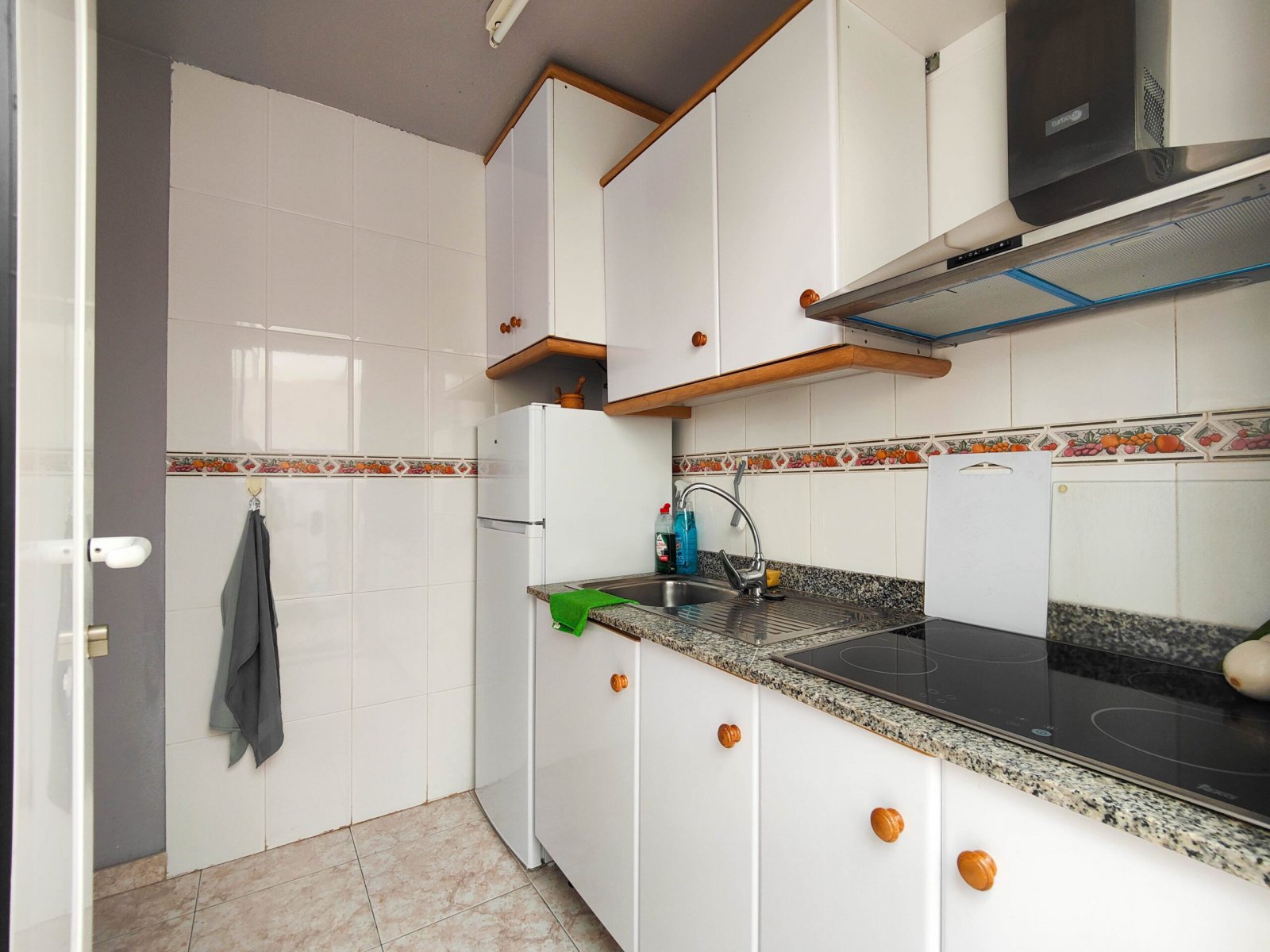   Beautiful corner quad house with a huge garden for sale in El Mirador de Los Altos, Orihuela Costa.  This charming quad house is located in a well-e