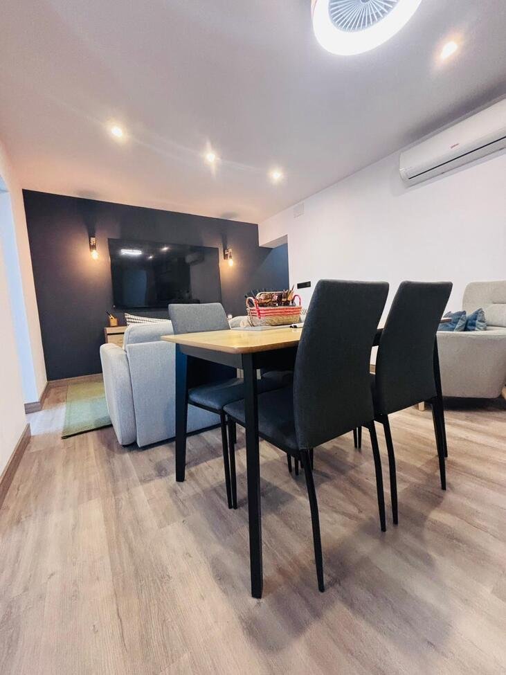   Located in the heart of the vibrant town of San Miguel de Salinas in the beautiful Alicante Province, this fully renovated four-bedroom townhouse of