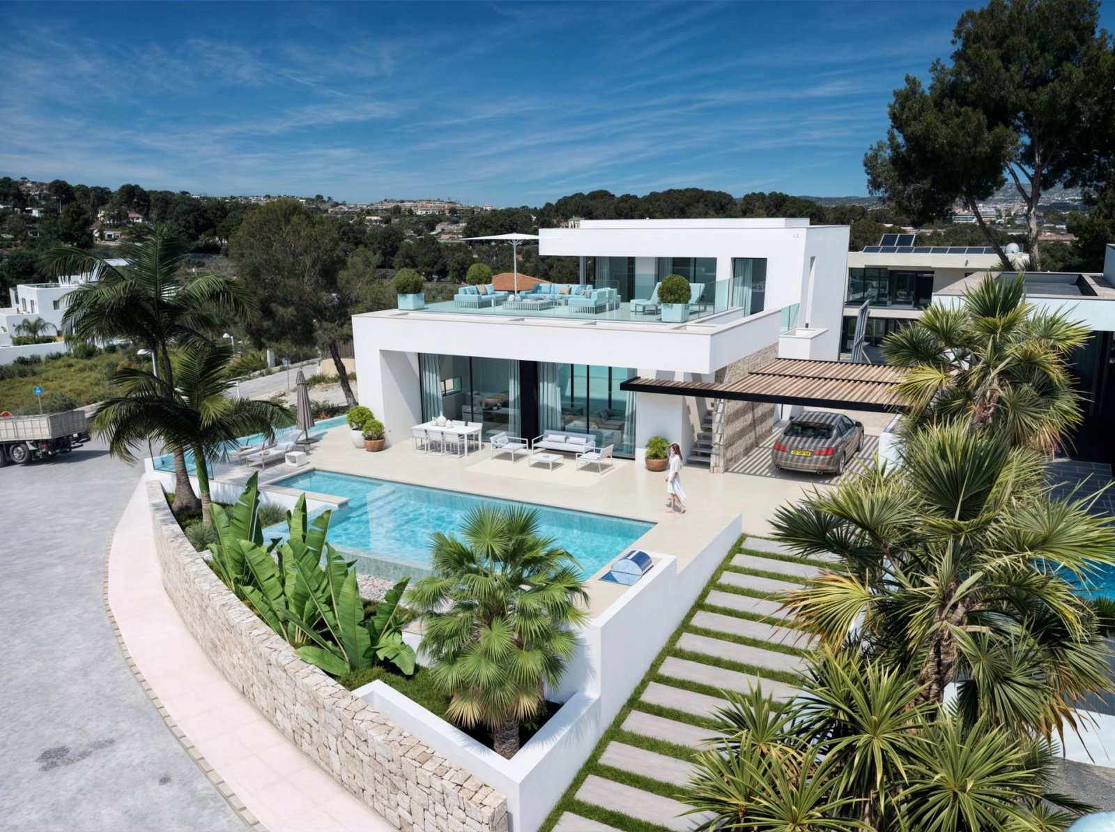  In der exklusiven Gegend von Moraira gelegen, bietet diese Villa eine privilegierte Umgebung mit beeindruckendem Meerblick. Entworfen für diejenigen,