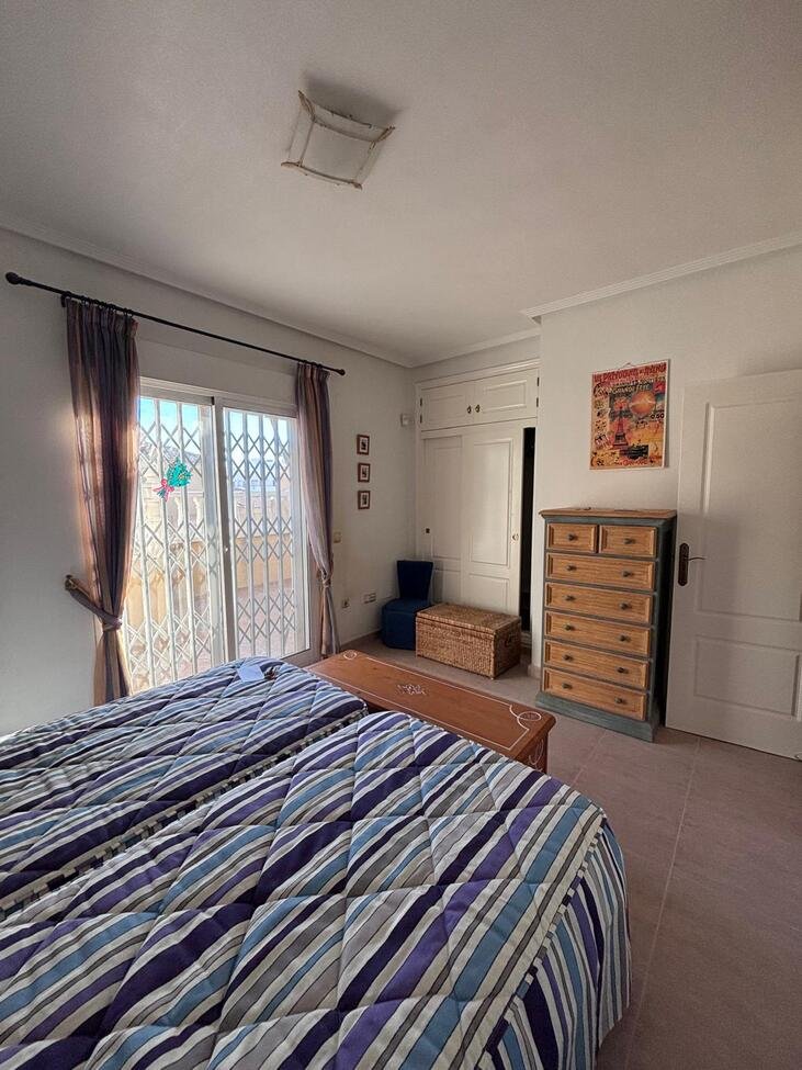   Charming Two-Bedroom Townhouse in Villamartin
This lovely two-bedroom townhouse is situated within a secure gated community in the sought-