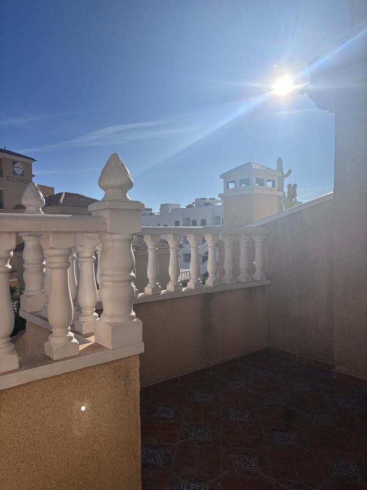   Charming Two-Bedroom Townhouse in Villamartin
This lovely two-bedroom townhouse is situated within a secure gated community in the sought-