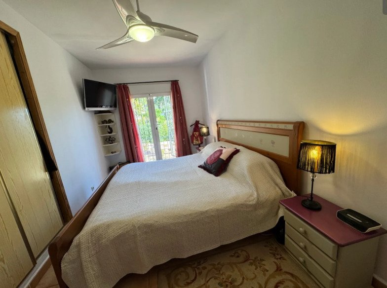   A delightful duplex townhouse only 1.8 km from Moraira centre. set on a small and incredibly pretty complex of 13 houses with a communal pool and be