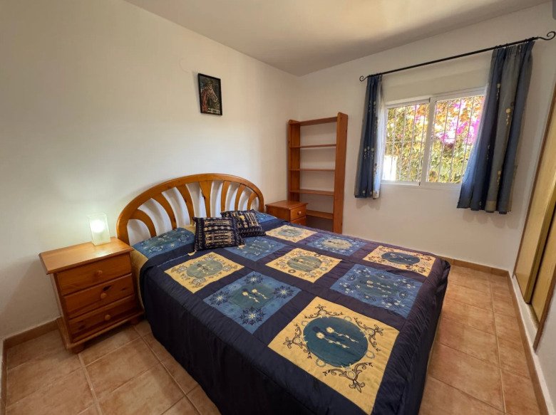   A delightful duplex townhouse only 1.8 km from Moraira centre. set on a small and incredibly pretty complex of 13 houses with a communal pool and be