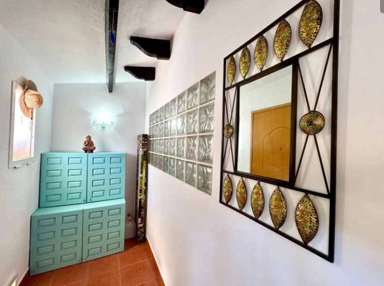   A delightful duplex townhouse only 1.8 km from Moraira centre. set on a small and incredibly pretty complex of 13 houses with a communal pool and be