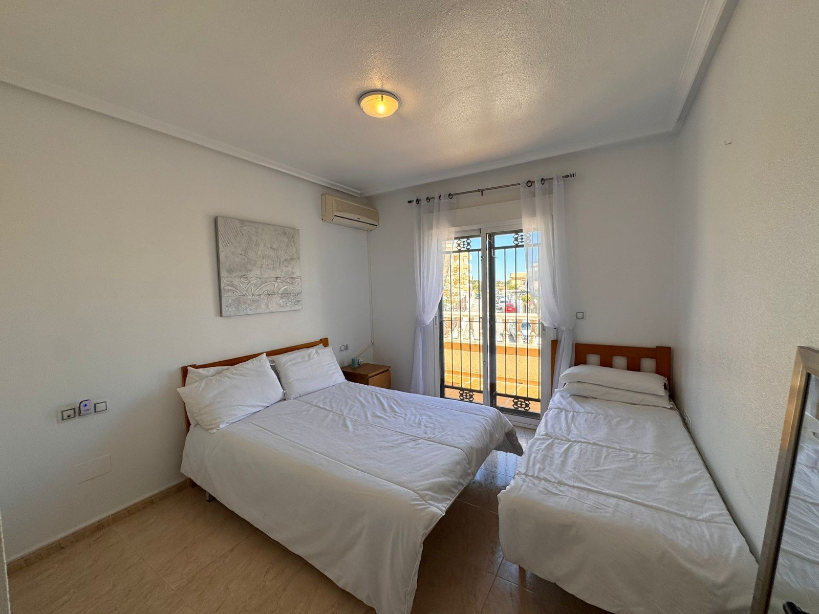   This charming property is tucked away in a lovely cul-de-sac, offering peace and privacy. Distributed over three levels, the home features three spa