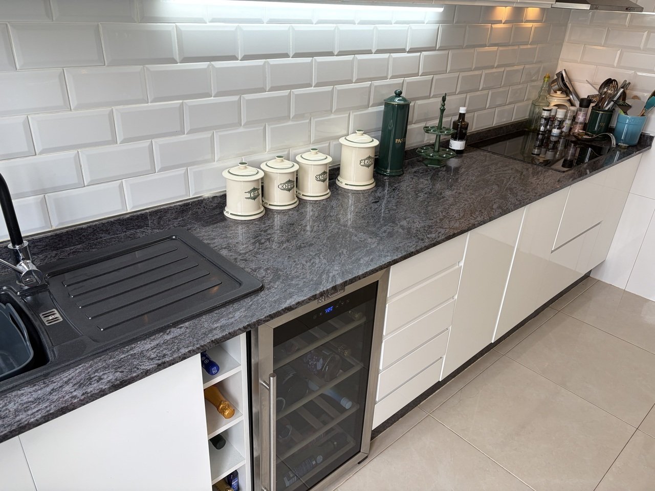 Outstanding 3 Bed, 3 Bath South facing Townhouse with large converted basement offering an additional room with En Suite bathroom. This is a fantast