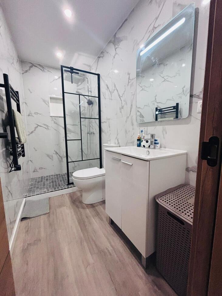 Located in the heart of the vibrant town of San Miguel de Salinas in the beautiful Alicante Province, this fully renovated four-bedroom townhouse of
