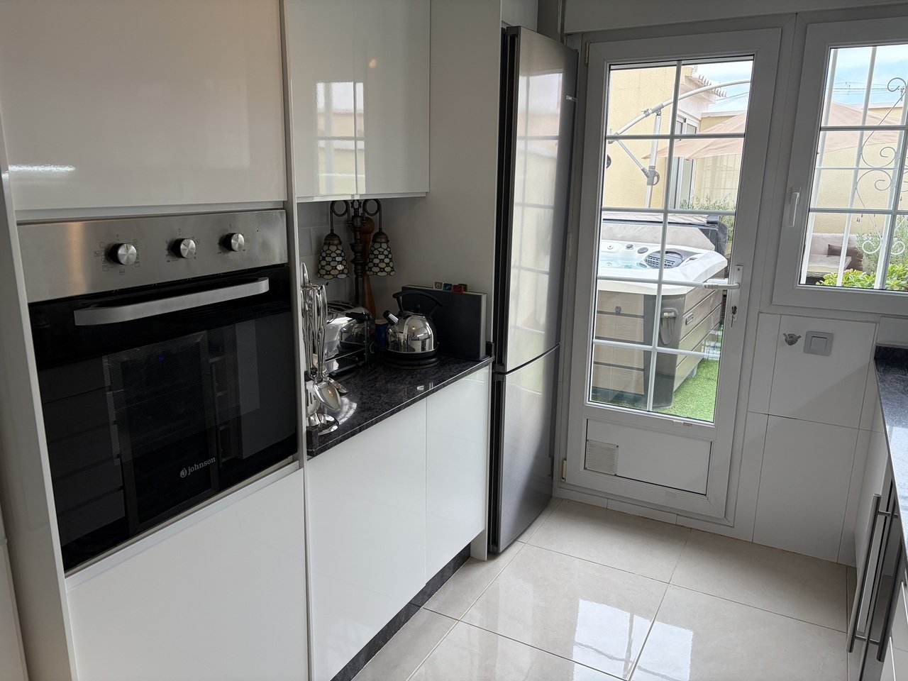  Outstanding 3 Bed, 3 Bath South facing Townhouse with large converted basement offering an additional room with En Suite bathroom. This is a fantast