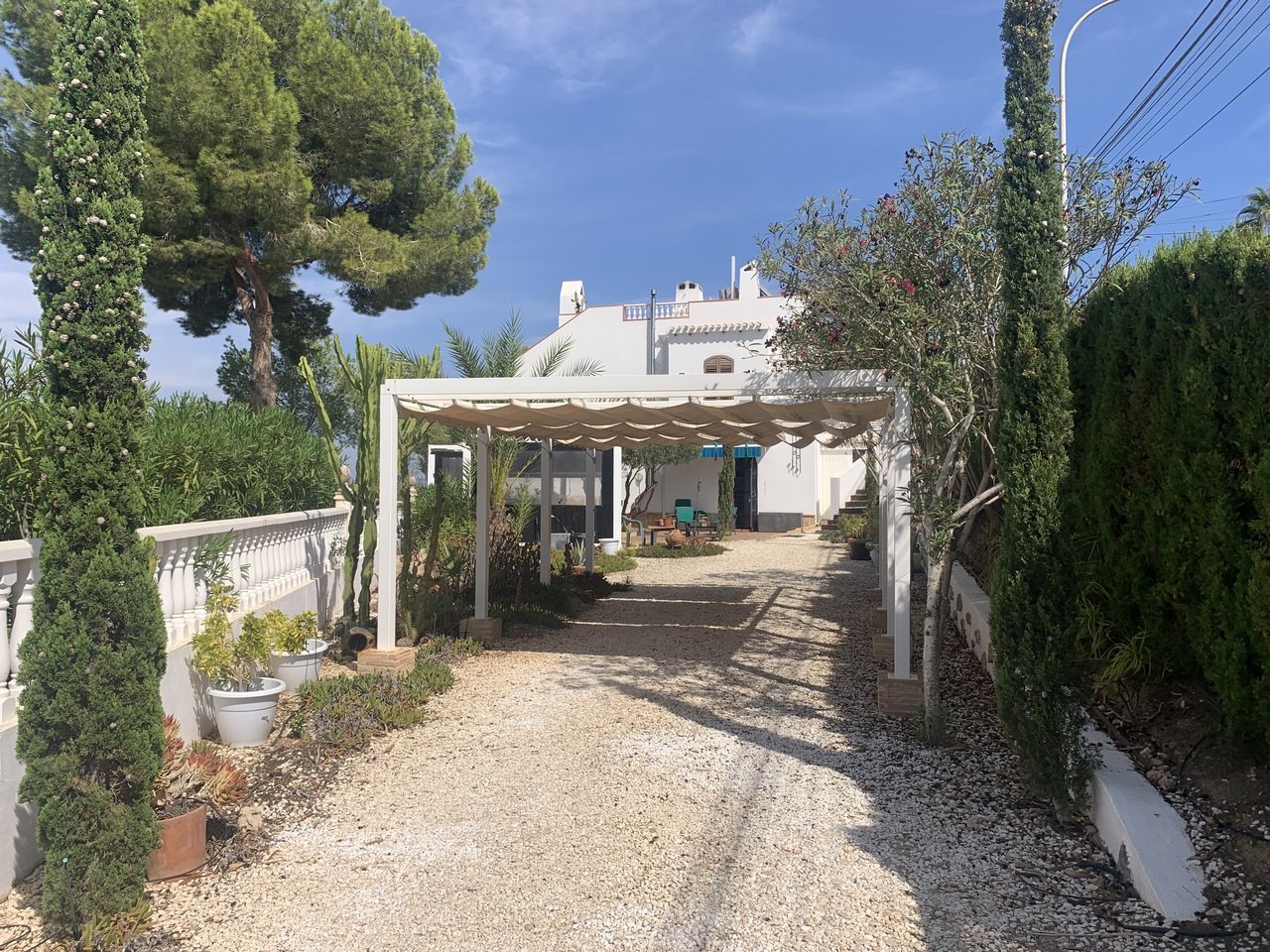   Price reduced to 849,900 Amazing Independent Villa with Golf Course Views in Villamartin**Discover this stunning 4-bedroom, Spanish-style villa, nes