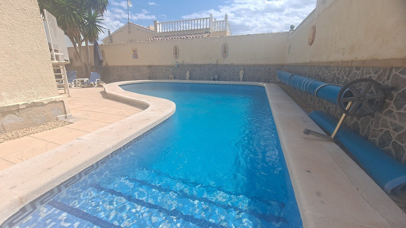   South-facing 3-bedroom detached villa with a private pool, situated in the desirable El Presidente area of Villamartin. Set on a 400m² walled plot, 