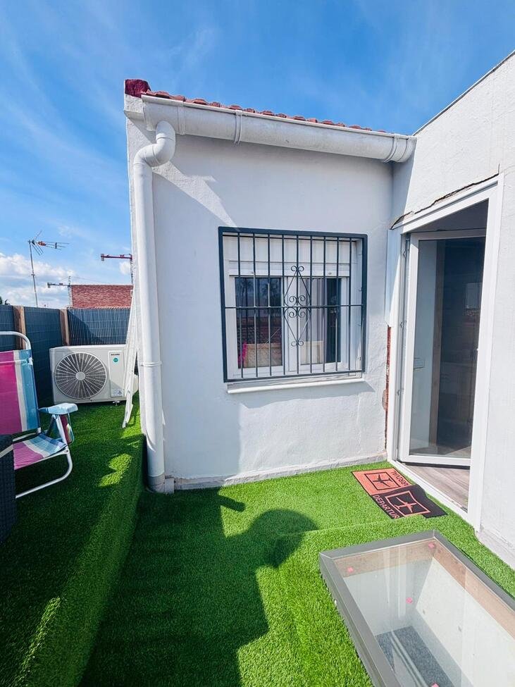 Located in the heart of the vibrant town of San Miguel de Salinas in the beautiful Alicante Province, this fully renovated four-bedroom townhouse of