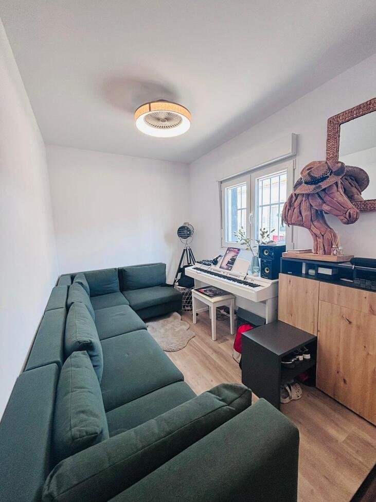 Located in the heart of the vibrant town of San Miguel de Salinas in the beautiful Alicante Province, this fully renovated four-bedroom townhouse of