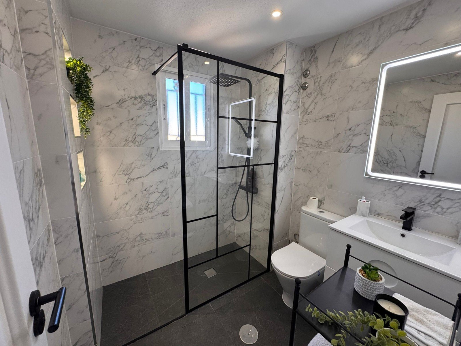 This charming property is tucked away in a lovely cul-de-sac, offering peace and privacy. Distributed over three levels, the home features three spa