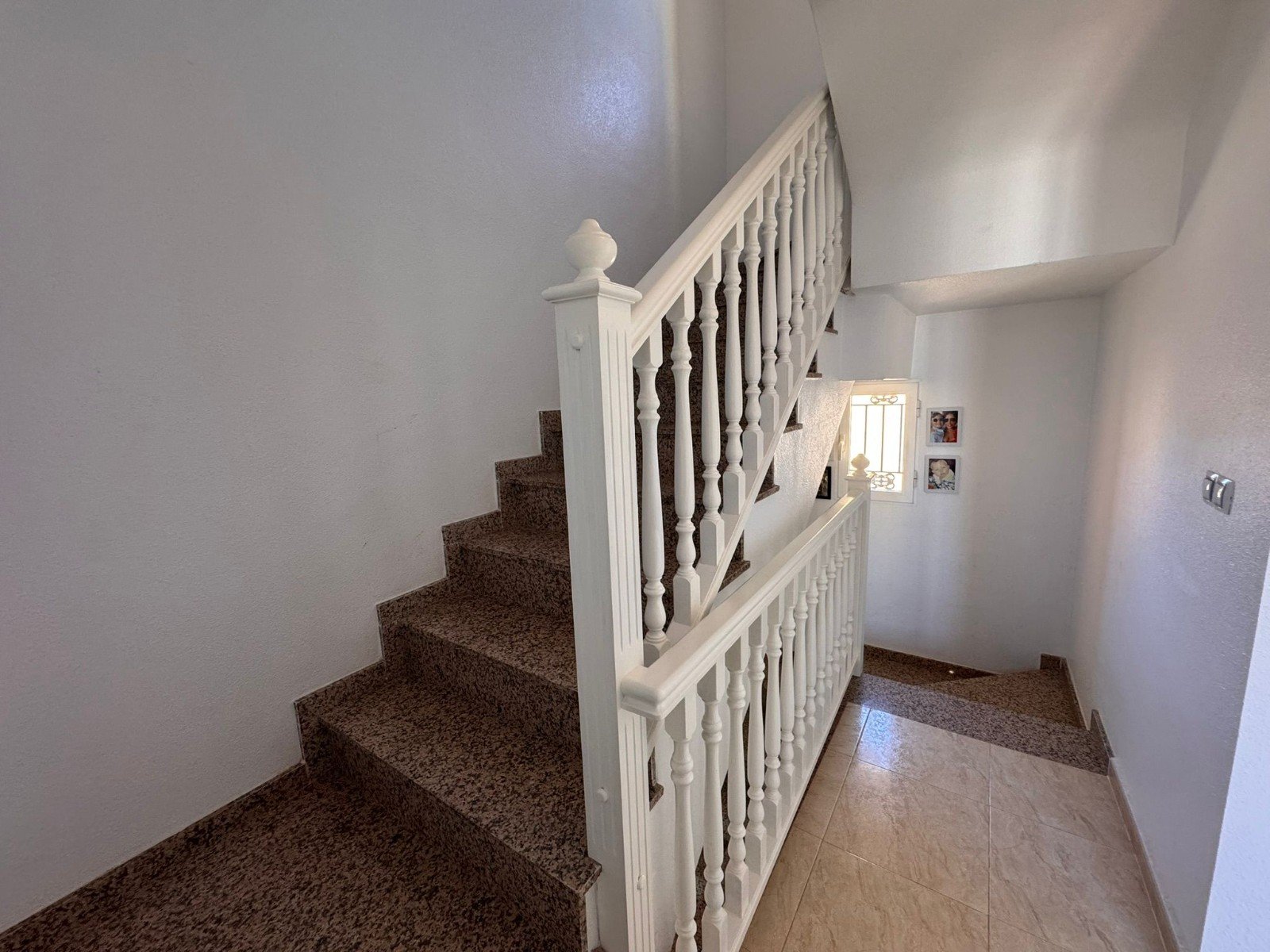 This charming property is tucked away in a lovely cul-de-sac, offering peace and privacy. Distributed over three levels, the home features three spa