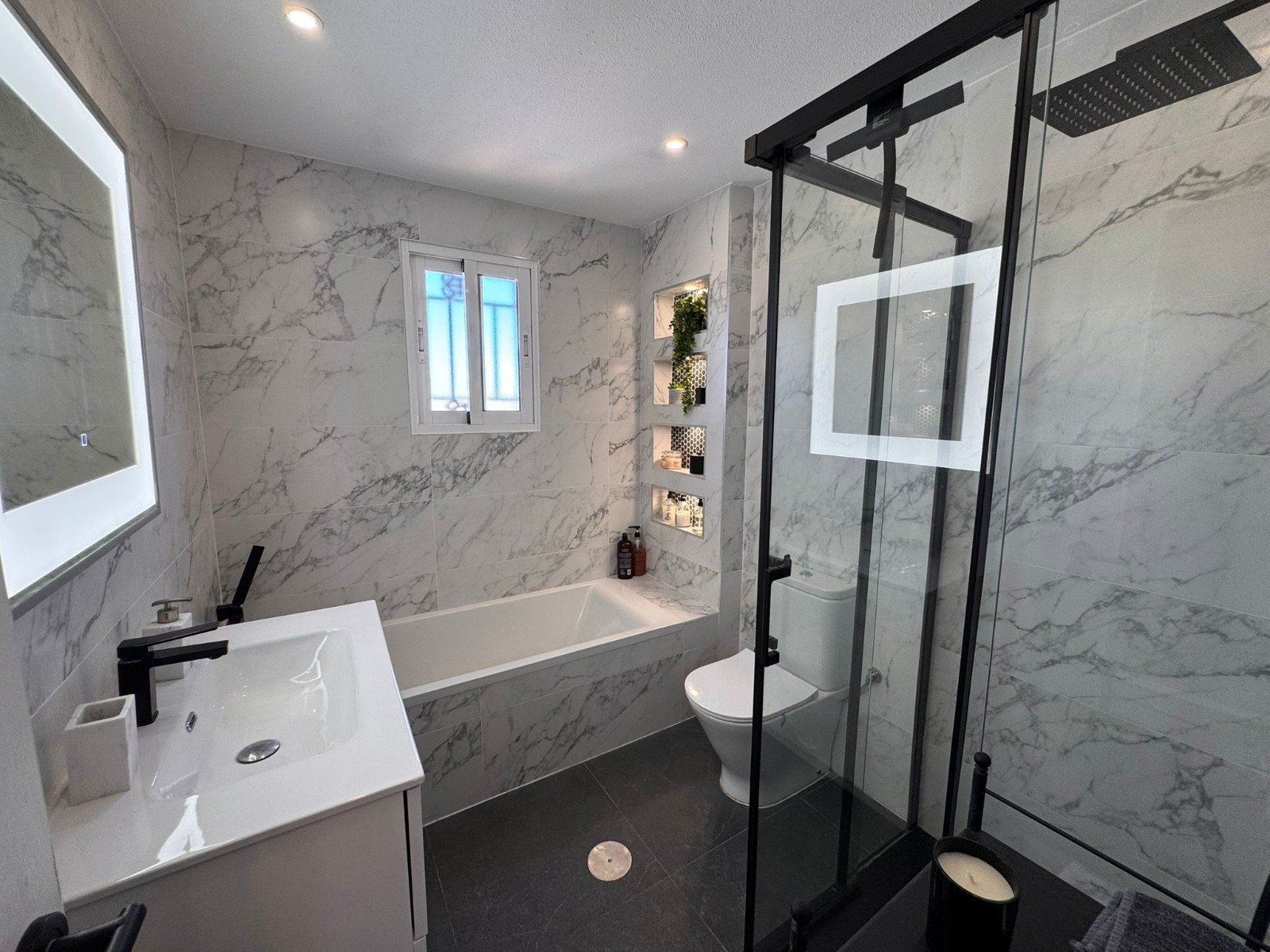 This charming property is tucked away in a lovely cul-de-sac, offering peace and privacy. Distributed over three levels, the home features three spa