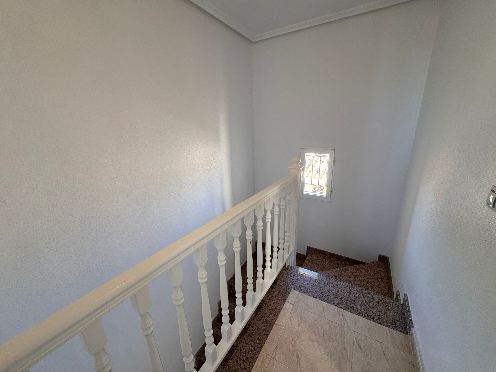 This charming property is tucked away in a lovely cul-de-sac, offering peace and privacy. Distributed over three levels, the home features three spa