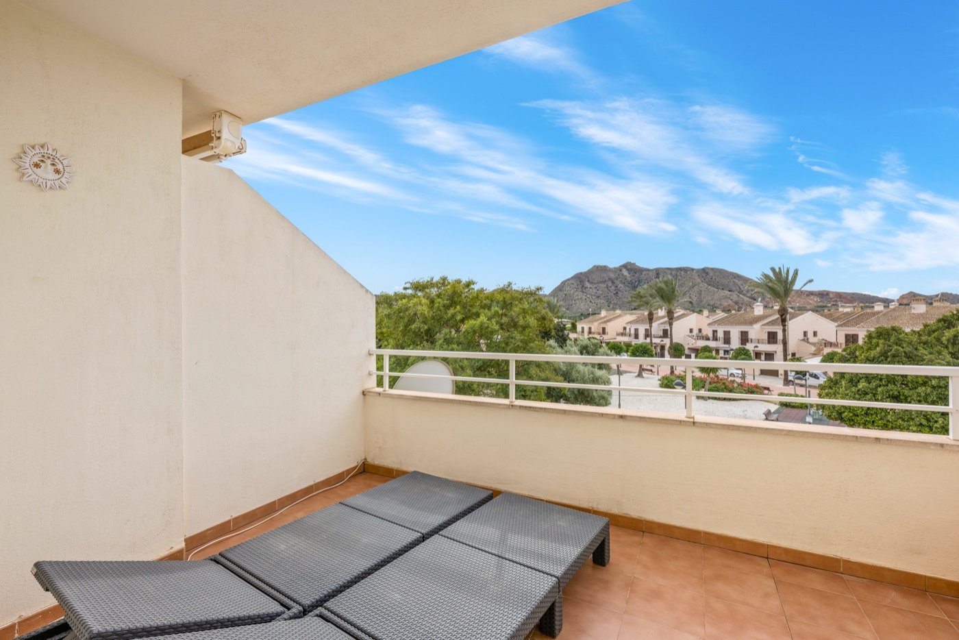   This beautifully maintained duplex apartment offers comfort, space, and pleasant natural light thanks to its south-facing location . The property fe