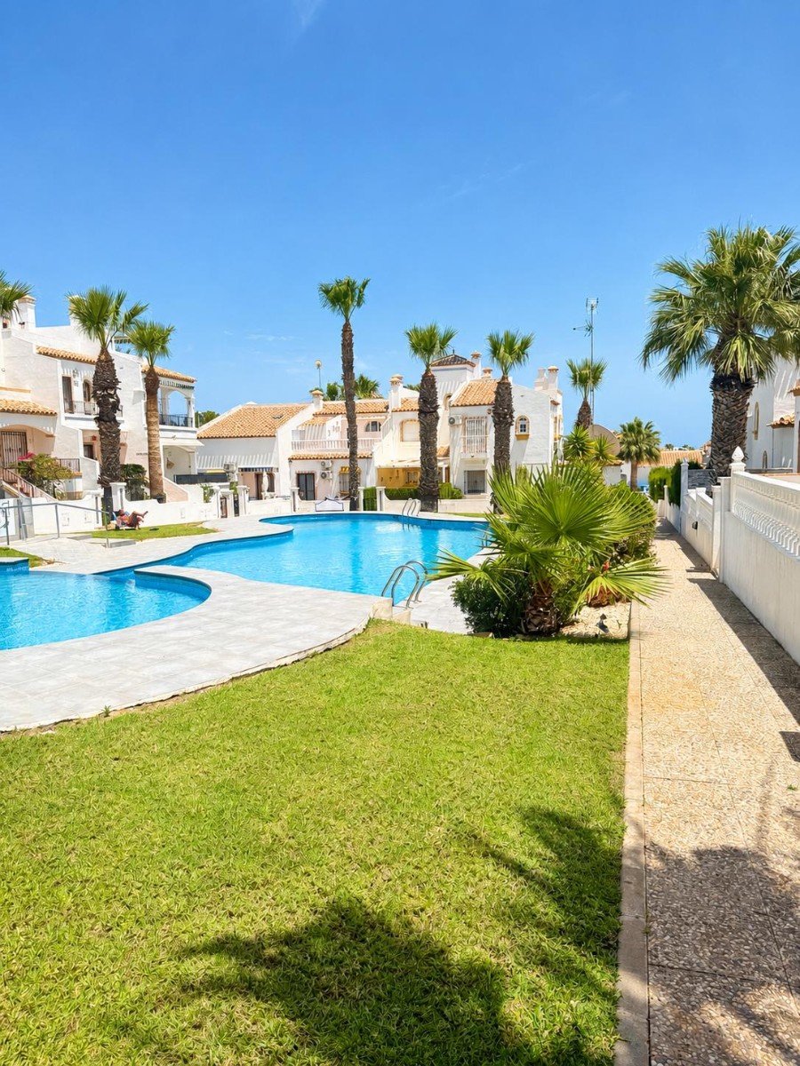   Welcome to this beautifully presented 2-bedroom, 2-bathroom first floor apartment, ideally situated in the highly desirable area of Los Dolses, perf
