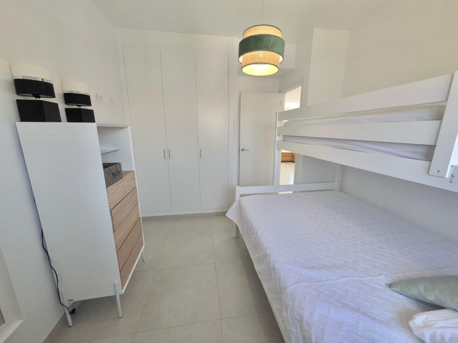 Discover stylish Mediterranean living with this exceptional penthouse apartment located in the highly sought-after Villamartin Gardens community in