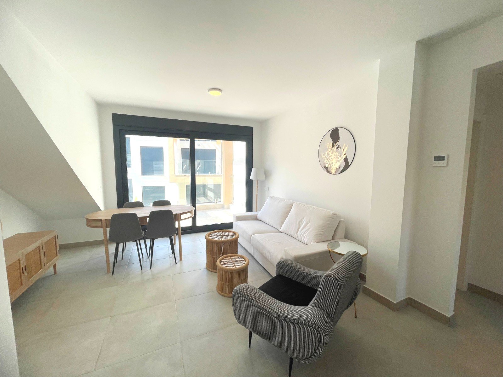 This South Facing, Two Bedroom, Top Floor Corner Apartment is located within a 10 minute walk of a main chain supermarket, JYSK furniture store, and