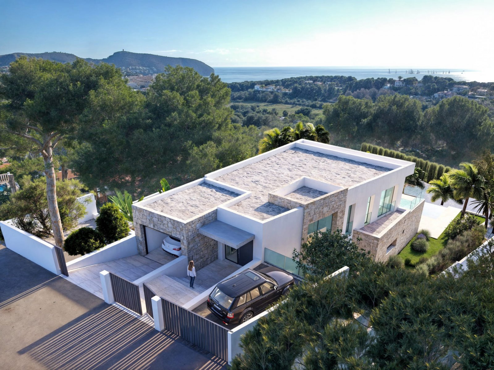 Diese exklusive Villa befindet sich in der charmanten Stadt Teulada und bietet eine privilegierte Umgebung mit Meerblick. Entworfen für diejenigen, d