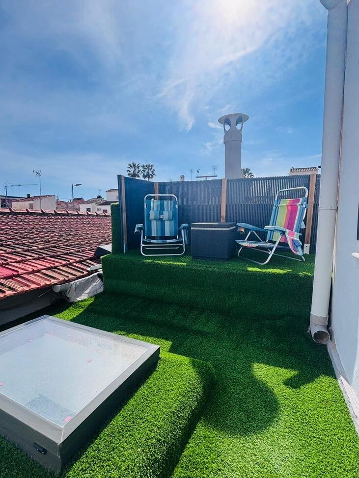 Located in the heart of the vibrant town of San Miguel de Salinas in the beautiful Alicante Province, this fully renovated four-bedroom townhouse of