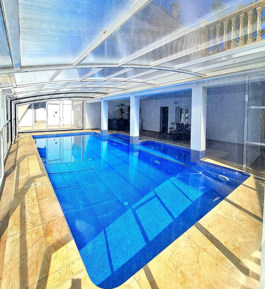   "Welcome to a three-story haven in Campoamor, just 500 meters from the sea! This spacious villa seamlessly blends luxury, comfort, and proximit