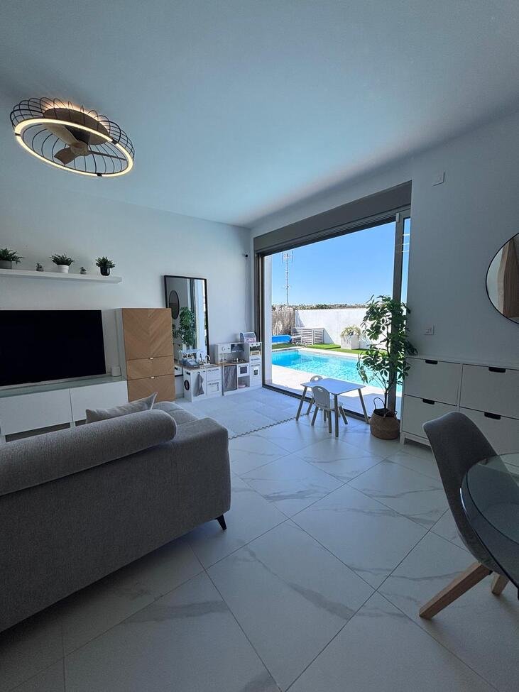 Beautiful 5-Bedroom Contemporary Villa with Heated Pool 
This stunning southwest-facing corner plot villa offers modern luxury, g