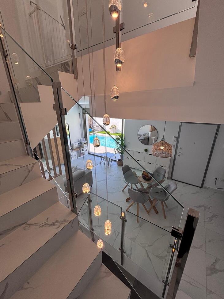 Beautiful 5-Bedroom Contemporary Villa with Heated Pool 
This stunning southwest-facing corner plot villa offers modern luxury, g