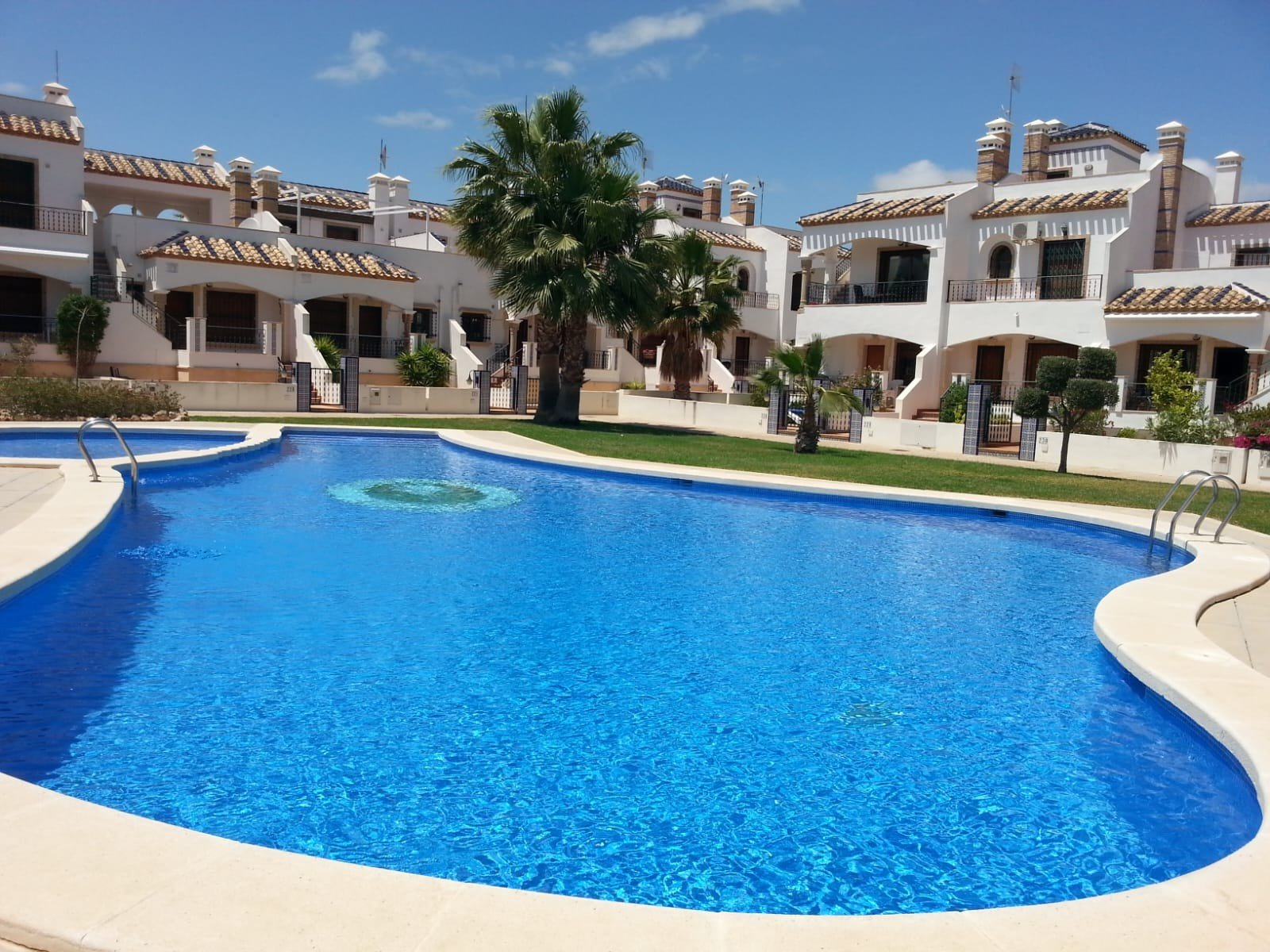 Discover this charming 2-bedroom duplex located in a private residential community, ideal as a permanent home, holiday property, or excellent invest
