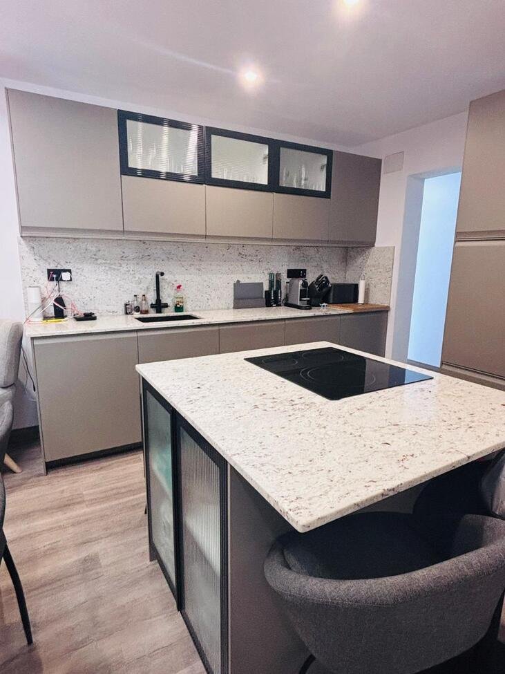 Located in the heart of the vibrant town of San Miguel de Salinas in the beautiful Alicante Province, this fully renovated four-bedroom townhouse of