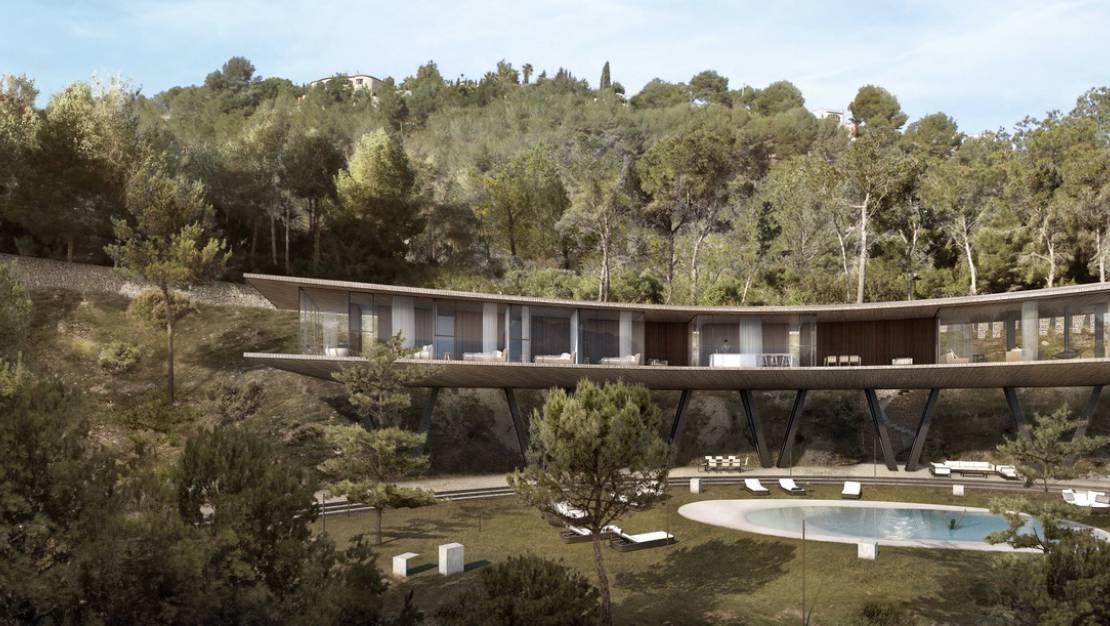 In der charmanten Stadt Benisa gelegen, bietet diese exklusive Villa eine privilegierte Umgebung mit Meerblick. Die Immobilie befindet sich nur 2,7 k