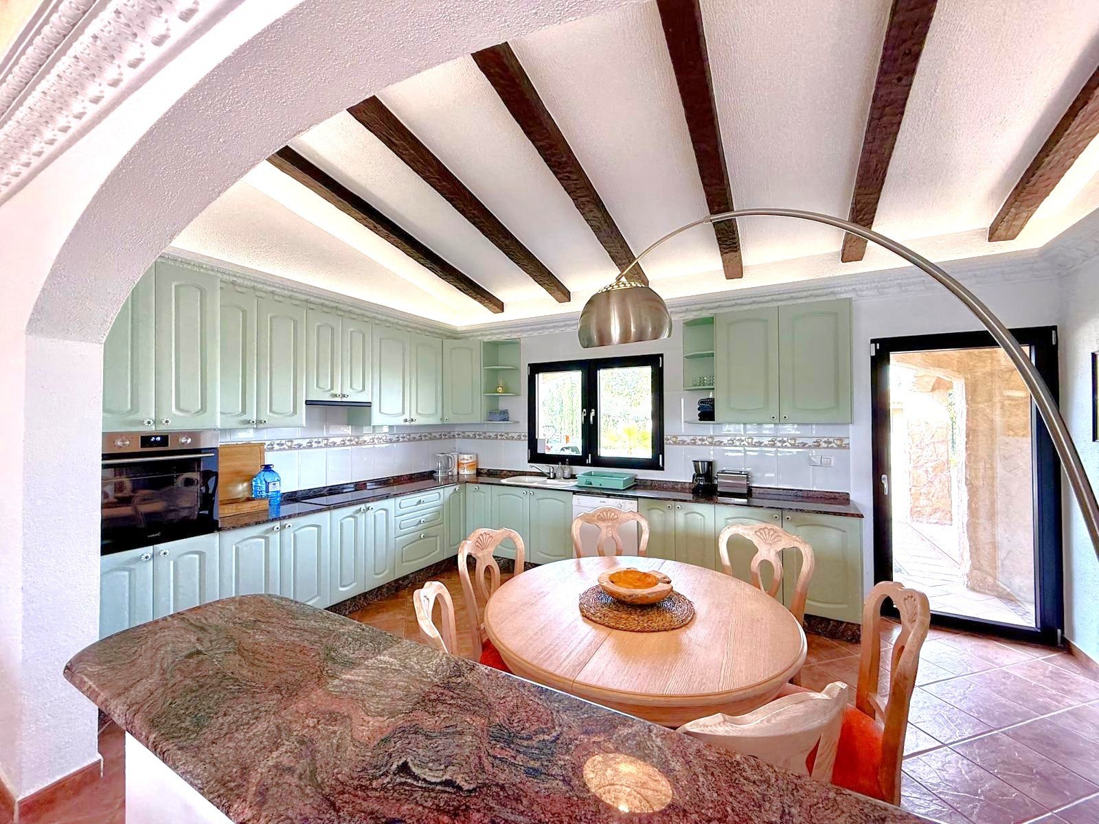 The property sits within a fenced-in land with a surface of 8.000 m2, predominantly flat with no views from neighbours;

 