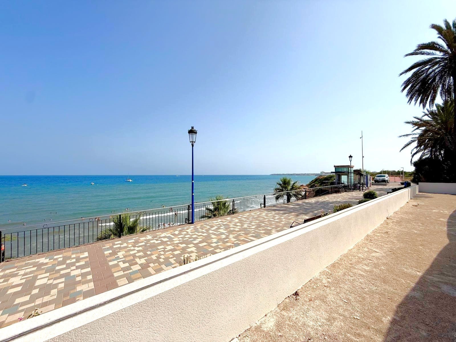   First line luxury villa under construction in Punta Prima
The first line plot of 1100 m2 with superb views over the Mediterranean sea 
