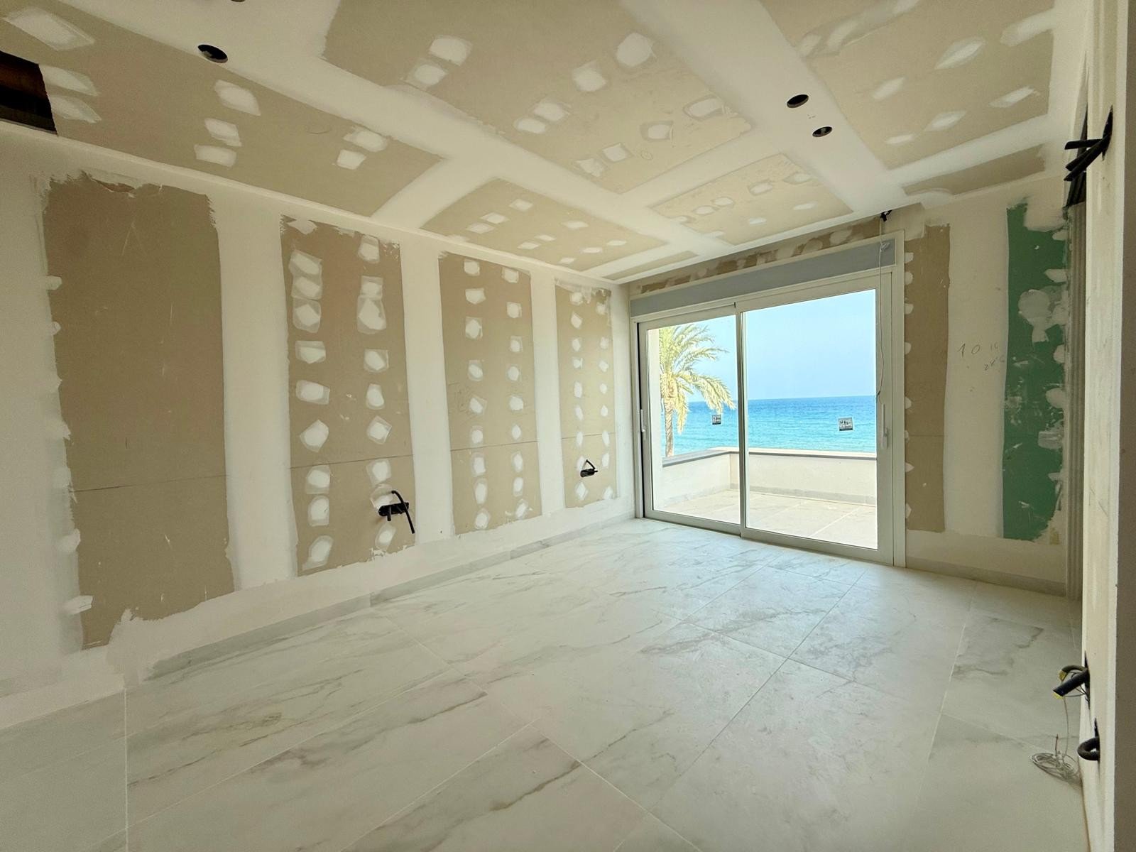   First line luxury villa under construction in Punta Prima
The first line plot of 1100 m2 with superb views over the Mediterranean sea 