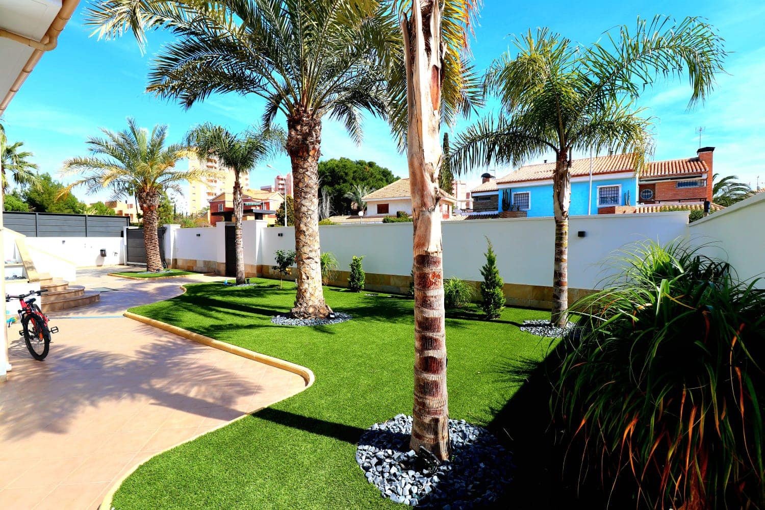 "Welcome to a three-story haven in Campoamor, just 500 meters from the sea! This spacious villa seamlessly blends luxury, comfort, and proximit