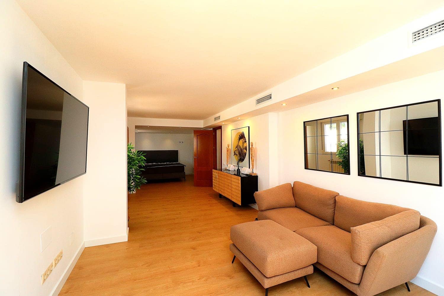 "Welcome to a three-story haven in Campoamor, just 500 meters from the sea! This spacious villa seamlessly blends luxury, comfort, and proximit