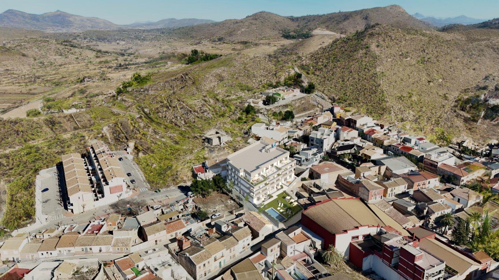 Gelegen im charmanten Dorf Hondón de las Nieves, bietet diese Wohnanlage eine Auswahl von 15 Wohnungen, darunter Apartments, Erdgeschosswohnungen und