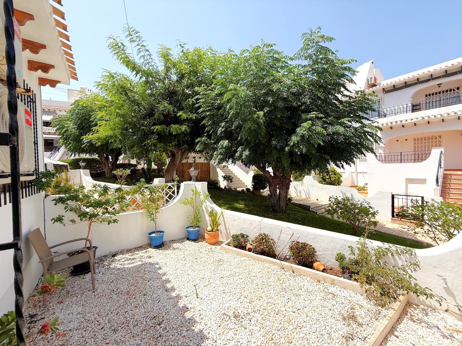 South facing fully refurbished townhouse with self-contained under build overlooking the picturesque communal streams and ponds and landscaped garde